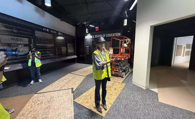 Jill Savitt, president and CEO of The National Center for Civil and Human Rights, describes the museum's expansion during a hard-hat tour, Wednesday, Sept. 10 in Atlanta. (AP Photo/Michael Warren)