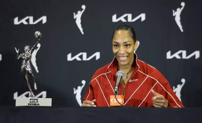 Las Vegas Aces center A'ja Wilson talks with reporters during a news conference Sunday, Sept. 21, 2025, in Las Vegas. (Steve Marcus /Las Vegas Sun via AP)