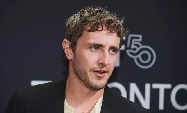 Actor Paul Mescal is photographed on the red carpet for the film "Hamnet" during the Toronto International Film Festival in Toronto, on Sunday, Sept. 7, 2025. (Sammy Kogan/The Canadian Press via AP)