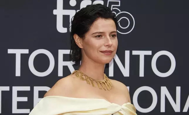 actor Jessie Buckley is photographed on the red carpet for the film "Hamnet" during the Toronto International Film Festival in Toronto, on Sunday, Sept. 7, 2025. (Sammy Kogan/The Canadian Press via AP)