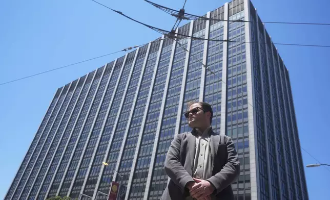 Marc Seawright poses for a photo outside of the Phillip Burton Federal Building and U.S. Courthouse in San Francisco, July 14, 2025. (AP Photo/Jeff Chiu)