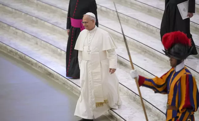 Pope Leo XIV attends an audience with the participants into a religious congress, Saturday, Sept. 6, 2025. (AP Photo/Andrew Medichini)