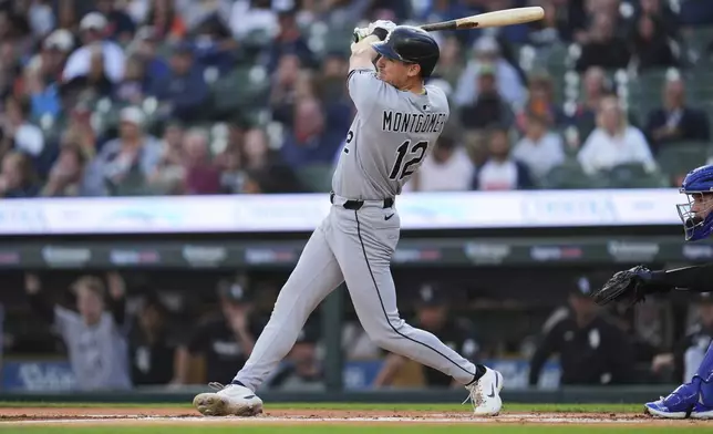 Chicago White Sox's Colson Montgomery hits a one-run single against the Detroit Tigers in the first inning during a baseball game Friday, Sept. 5, 2025, in Detroit. (AP Photo/Paul Sancya)