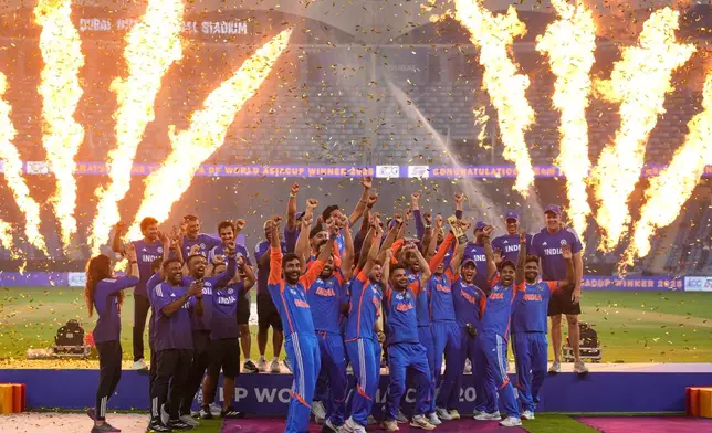 Team India celebrates after winning the Asia Cup cricket final against Pakistan at Dubai International Cricket Stadium, United Arab Emirates, Sunday, Sept. 28, 2025. (AP Photo/Altaf Qadri)