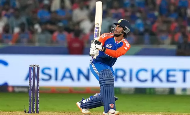 India's Tilak Varma bats during the Asia Cup cricket final between India and Pakistan at Dubai International Cricket Stadium, United Arab Emirates, Sunday, Sept. 28, 2025. (AP Photo/Altaf Qadri)