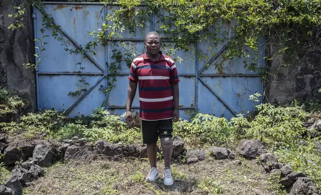Jerome Jean-Claude Amani, one of many wounded by fighting in the region, poses for a photo at an orthopedic center run by the Catholic church and supported by Red Cross in Goma, eastern Congo, Friday, Aug. 29, 2025. (AP Photo/Moses Sawasawa)