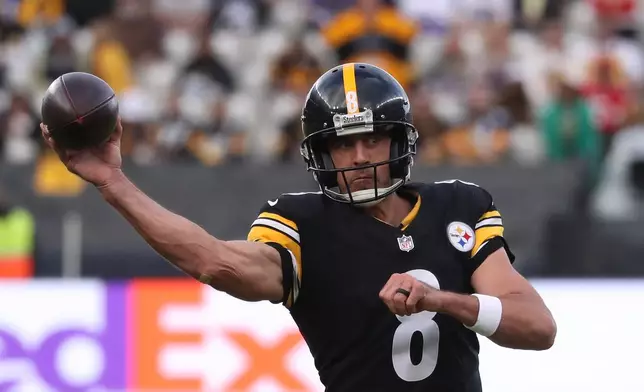 Pittsburgh Steelers quarterback Aaron Rodgers (8) throws the ball during the NFL football game between Minnesota Vikings and Pittsburgh Steelers at Croke Park stadium in Dublin, Sunday, Sept. 28, 2025.(AP Photo/Peter Morrison)