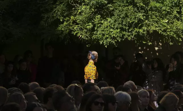 A model wears a creation as part of the Francesca Liberatore Spring/Summer 2026 collection presented in Milan, Italy, Sunday, Sept. 28, 2025. (AP Photo/Antonio Calanni)