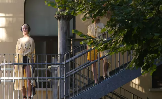 A model wears a creation as part of the Francesca Liberatore Spring/Summer 2026 collection presented in Milan, Italy, Sunday, Sept. 28, 2025. (AP Photo/Antonio Calanni)