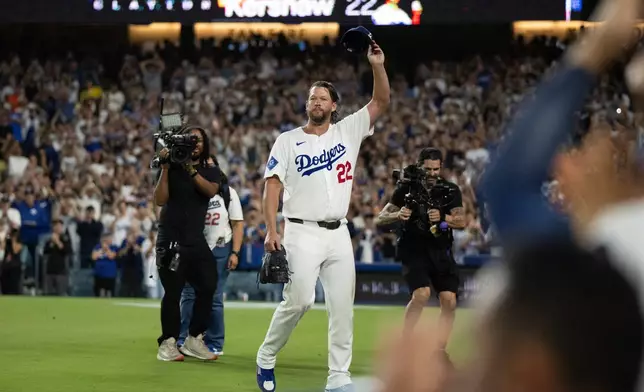CORRECTS FROM FOURTH INNING TO FIFTH - Los Angeles Dodgers starting pitcher Clayton Kershaw (22) tips his cap after being removed during the fifth inning of a baseball game against the San Francisco Giants in Los Angeles, Friday, Sept. 19, 2025. (AP Photo/Kyusung Gong)