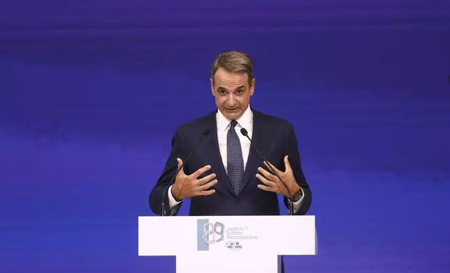 Greece's Prime Minister Kyriakos Mitsotakis delivers a speech during Thessaloniki's international trade fair, at the northern city of Thessaloniki, Greece, Saturday, Sept. 6, 2025. (AP Photo/Giannis Papanikos)