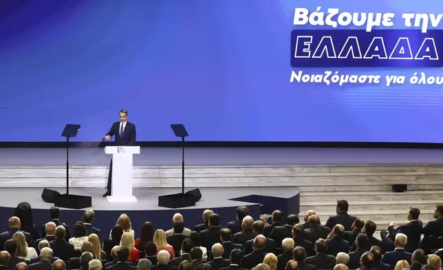 Greece's Prime Minister Kyriakos Mitsotakis delivers a speech during Thessaloniki's international trade fair, at the northern city of Thessaloniki, Greece, Saturday, Sept. 6, 2025. (AP Photo/Giannis Papanikos)