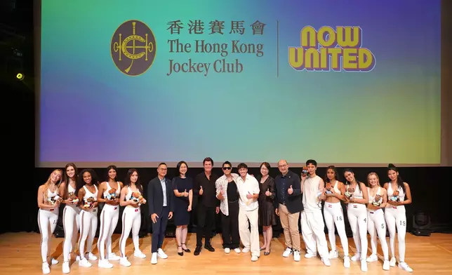 Posing for a group photo with Now United members on stage are Simon Fuller, Founder of XIX Entertainment (8th left); Angelina Cheung, Commissioner for Tourism (7th right); Joanne Chu, Deputy Commissioner for Tourism (7th left); Dennis Hau, the Club’s Executive Director of Customer Strategy, Insights and Innovation (6th left); Raymond Tam, the Club’s Executive Director of Corporate Affairs (6th right); and Aaron Kwok, HKJC’s Rising Stars Ambassador (centre).