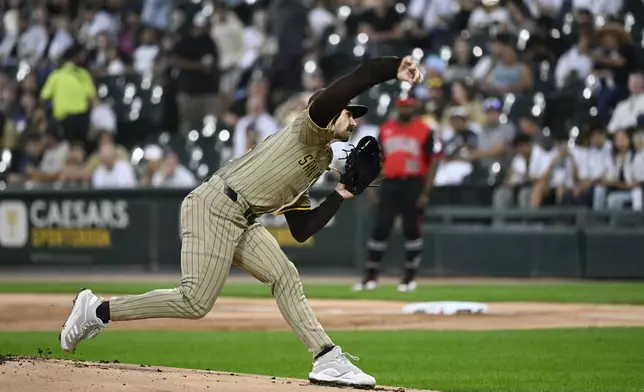 San Diego Padres pitcher Dylan Cease delivers during the first inning of a baseball game against the Chicago White Sox, Friday, Sept. 19, 2025, in Chicago. (AP Photo/Matt Marton)