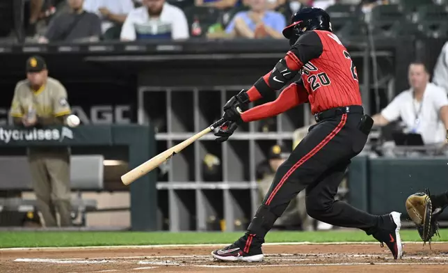 Chicago White Sox's Miguel Vargas hits a two-run home run during the first inning of a baseball game against the San Diego Padres, Friday, Sept. 19, 2025, in Chicago. (AP Photo/Matt Marton)