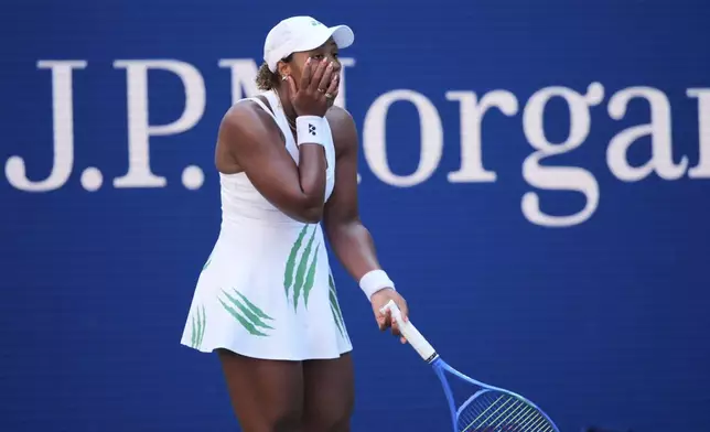 Taylor Townsend, of the United States, reacts to losing advantage against Barbora Krejcikova, of the Czech Republic, during the fourth round of the U.S. Open tennis championships, Sunday, Aug. 31, 2025, in New York. (AP Photo/Pamela Smith)