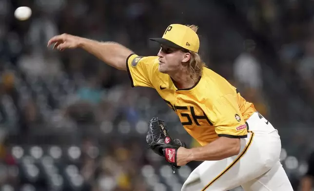 Pittsburgh Pirates pitcher Carmen Mlodzinski delivers during the sixth inning of a baseball game against the Milwaukee Brewers, Friday, Sept. 5, 2025, in Pittsburgh. (AP Photo/Matt Freed)