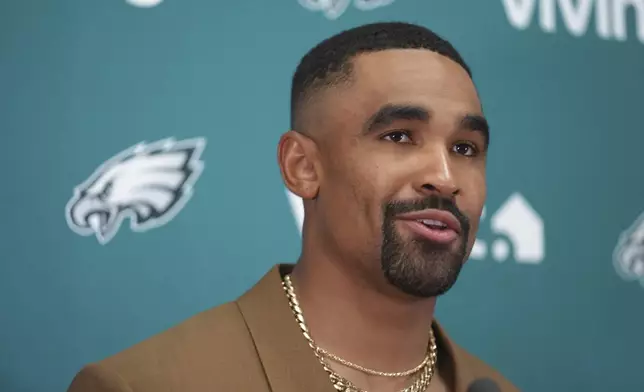 Philadelphia Eagles quarterback Jalen Hurts speaks during a news conference following an NFL football game against the Kansas City Chiefs Sunday, Sept. 14, 2025, in Kansas City, Mo. (AP Photo/Ed Zurga)