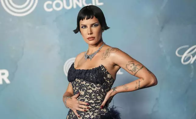 Halsey poses for photographers upon arrival at the amfAR, foundation for aids research, gala, at the Arsenale di Venezia, during the 82nd edition of the Venice Film Festival in Venice, Italy, on Sunday, Aug. 31, 2025. (Photo by Scott A Garfitt/Invision/AP)