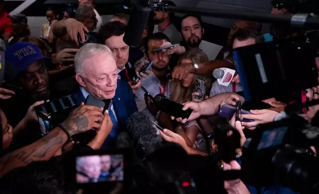 Dallas Cowboys owner Jerry Jones speaks to reporters following an NFL football game against the Green Bay Packers Sunday, Sept. 28, 2025, in Arlington, Texas. (AP Photo/Jeffrey McWhorter)