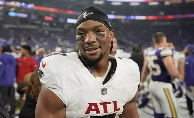Atlanta Falcons running back Bijan Robinson (7) after an NFL football game, Sunday, Sept. 14, 2025, in Minneapolis. (AP Photo/Mike Stewart)