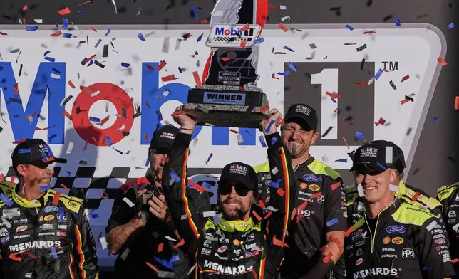 Ryan Blaney celebrates after winning a NASCAR Cup Series race at New Hampshire Motor Speedway, Sunday, Sept. 21, 2025, in Loudon, N.H. (AP Photo/Charles Krupa)