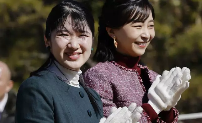 Japan's Princess Aiko, left, and Princess Kako attend an event at an imperial wild duck preserve in Ichikawa, Chiba prefecture, Japan on Feb. 14, 2025. (Daiki Katagiri/Kyodo News via AP)
