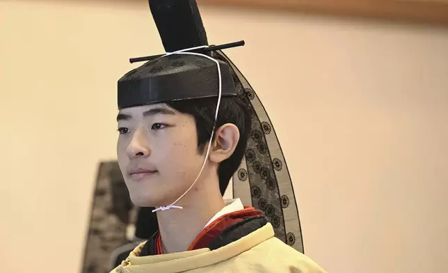 Japanese Prince Hisahito is seen in ceremonial attire during his coming-of-age rites in the Imperial Palace on his 19th birthday in Tokyo on Saturday, Sept. 6, 2025. (Kyodo News via AP)