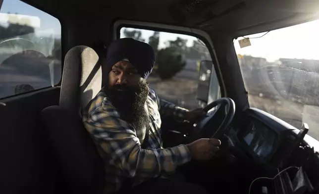 Sikh truck driver Prahb Singh maneuvers his truck at a gas station in Fontana, Calif., Wednesday, Sept. 3, 2025. (AP Photo/Jae C. Hong)