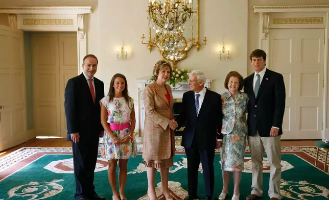 FILE - Daniel Rooney, Ambassador of the United States of America to Ireland meets with Irish President Mary Mc Aleese at Aras an Uachtarain, Dublin, Ireland, Friday, July, 2, 2009 (AP Photo/Peter Morrison, file)