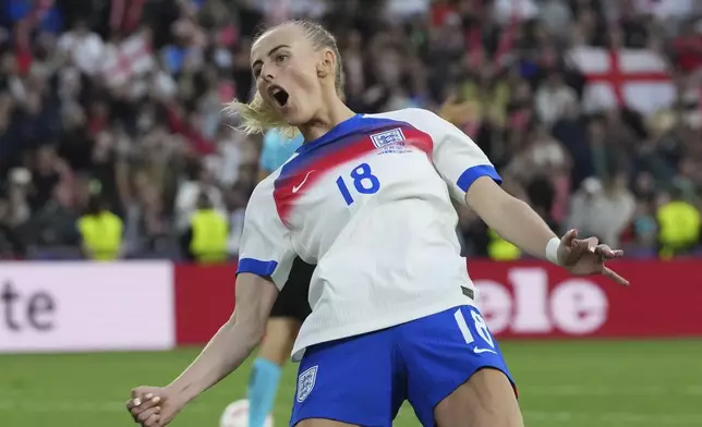 FILE - England's Chloe Kelly celebrates after scoring the winning penalty of the Women's Euro 2025 final soccer match between England and Spain at St. Jakob-Park in Basel, Switzerland, on July 27, 2025. (AP Photo/Martin Meissner, File)