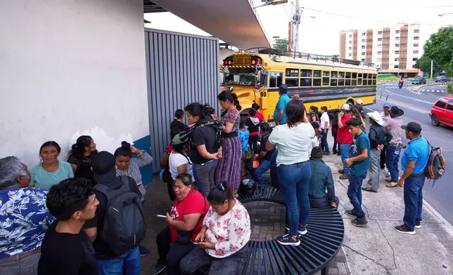 FILE - People wait for loved ones from Guatemala deported from the United States outside La Aurora International Airport, in Guatemala City, Aug. 31, 2025. (AP Photo/Moises Castillo, File)