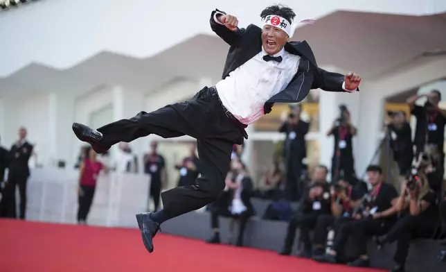 Daisuke Tarutani poses for photographers on the red carpet for the film 'The Sun Rises on Us All' during the 82nd edition of the Venice Film Festival in Venice, Italy, on Friday, Sept. 5, 2025. (Photo by Alessandra Tarantino/Invision/AP)
