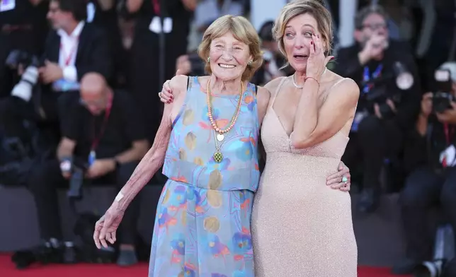 Marisa Borini, left, and Valeria Bruni Tedeschi pose for photographers on the red carpet for the film 'Duse' during the 82nd edition of the Venice Film Festival in Venice, Italy, on Wednesday, Sept. 3, 2025. (Photo by Scott A Garfitt/Invision/AP)