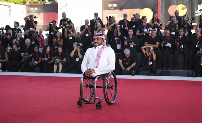 Abdulrahman Al-Qurashi poses for photographers on the red carpet for the film 'Duse' during the 82nd edition of the Venice Film Festival in Venice, Italy, on Wednesday, Sept. 3, 2025. (Photo by Alessandra Tarantino/Invision/AP)