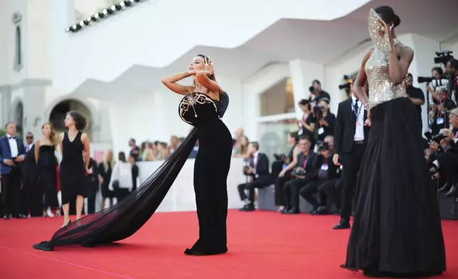 Madalina Diana Ghenea poses for photographers on the red carpet for the film 'The Smashing Machine' during the 82nd edition of the Venice Film Festival in Venice, Italy, on Monday, Sept. 1, 2025. (Photo by Alessandra Tarantino/Invision/AP)