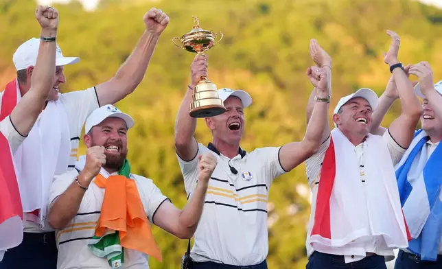 Europe captain Luke Donald poses with the trophy after winning the Ryder Cup golf tournament against the United States on the Bethpage Black golf course, Sunday, Sept. 28, 2025, in Farmingdale, N.Y. (AP Photo/Lindsey Wasson)