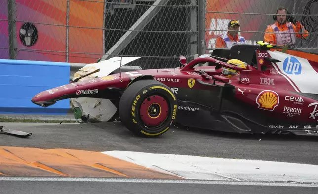 Ferrari driver Lewis Hamilton of Britain crashes during the Formula One Dutch Grand Prix in Zandvoort, Netherlands, Sunday, Aug. 31, 2025. (AP Photo/Peter Dejong)