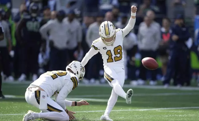 New Orleans Saints place-kicker Blake Grupe (19) kicks a field goal during the first half of an NFL football game against the Seattle Seahawks, Sunday, Sept. 21, 2025, in Seattle. (AP Photo/Stephen Brashear)