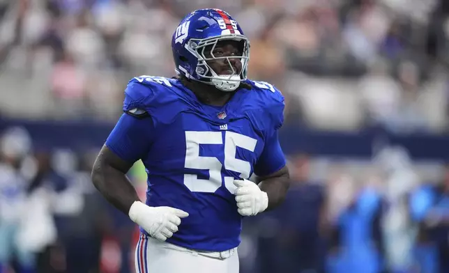 New York Giants' James Hudson III jogs off the field after a play in the first half of an NFL football game against the Dallas Cowboys Sunday, Sept. 14, 2025, in Arlington, Texas. (AP Photo/Julio Cortez)