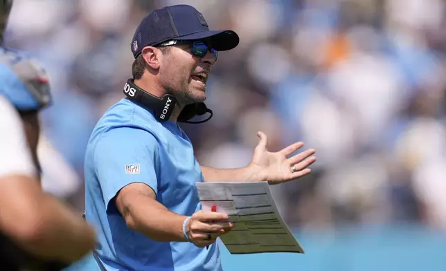 Tennessee Titans head coach Brian Callahan reacts after a touchdown was called back due to a penalty during the first half of an NFL football game against the Los Angeles Rams, Sunday, Sept. 14, 2025, in Nashville, Tenn. (AP Photo/George Walker IV)