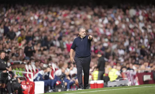 Nottingham Forest's head coach Ange Postecoglou watches the play during the Premier League soccer match between Arsenal and Nottingham Forest in London, Saturday, Sept. 13, 2025. (AP Photo/Kin Cheung)
