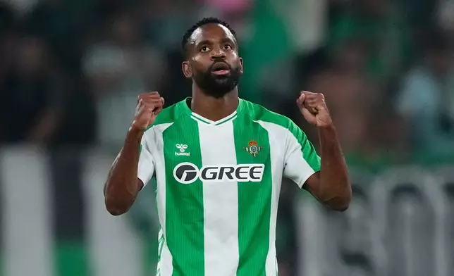 Betis' Cedric Bakambu reacts after scoring during the Europa League soccer match between Real Betis and Nottingham Forest in Seville, Spain, Wednesday, Sept. 24, 2025. (AP Photo/Jose Breton)