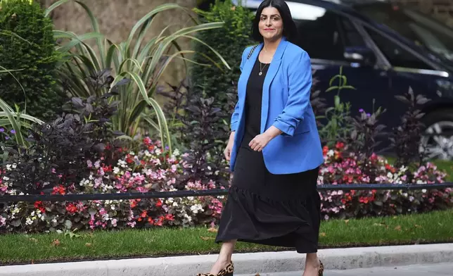Newly appointed Home Secretary Shabana Mahmood arrives in Downing Street, London, Friday, Sept. 5, 2025, where Prime Minister Sir Keir Starmer is reshuffling his Cabinet following the resignation of Angela Rayner. (James Manning/PA via AP)