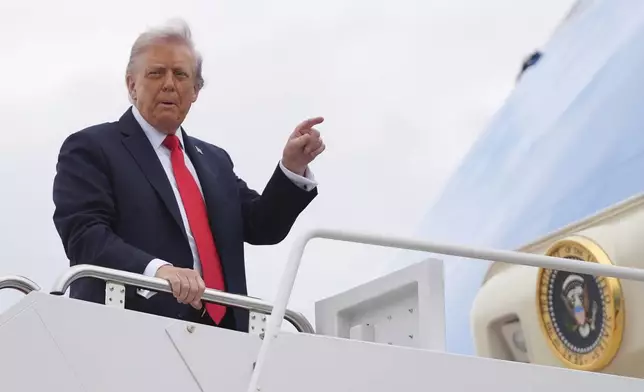 President Donald Trump boards Air Force One, Tuesday, Sept. 16, 2025, in Joint Base Andrews, Md. (AP Photo/Evan Vucci)