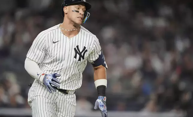 New York Yankees' Aaron Judge runs to first base for a single during the sixth inning of a baseball game against the Detroit Tigers Thursday, Sept. 11, 2025, in New York. (AP Photo/Frank Franklin II)