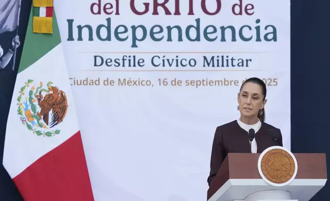 President Claudia Sheinbaum speaks at the annual Independence Day military parade, in Mexico City, Tuesday, Sept. 16, 2025. (AP Photo/Fernando Llano)
