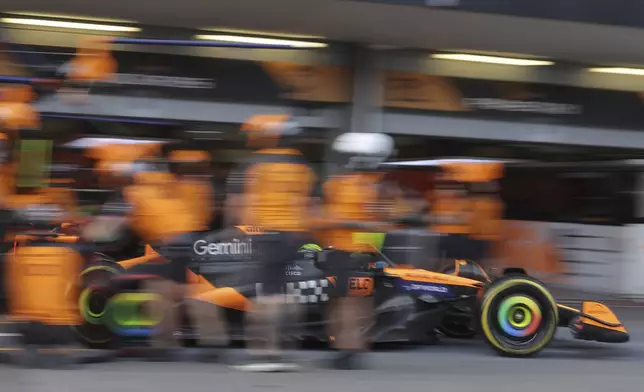 McLaren driver Lando Norris of Britain makes a pit stop during the qualifying for the Azerbaijan Formula One Grand Prix in Baku, Azerbaijan, Saturday, Sept. 20, 2025. (AP Photo/Anton Vaganov, Pool)