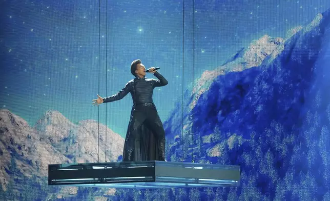 Serbia's Slobodan Trkulja performs the song "Three Little Roses" at the International Music Competition "Intervision" at the Live Arena outside Moscow, Russia, Saturday, Sept. 20, 2025. (AP Photo/Alexander Zemlianichenko)