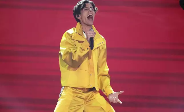 Tadjikistan's Farrukh Hasanov performs the song "Burn!" at the International Music Competition "Intervision" at the Live Arena outside Moscow, Russia, Saturday, Sept. 20, 2025. (AP Photo/Alexander Zemlianichenko)